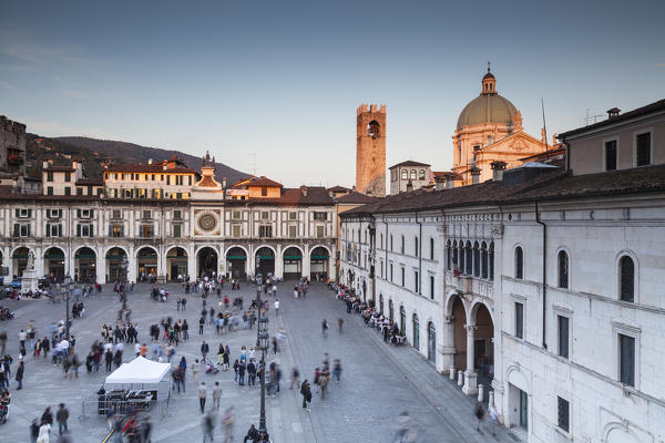 Brescia, Lombardy, Italy. Loggia square and Brescia's cathedral at sunset view from a balcony of Loggia's building