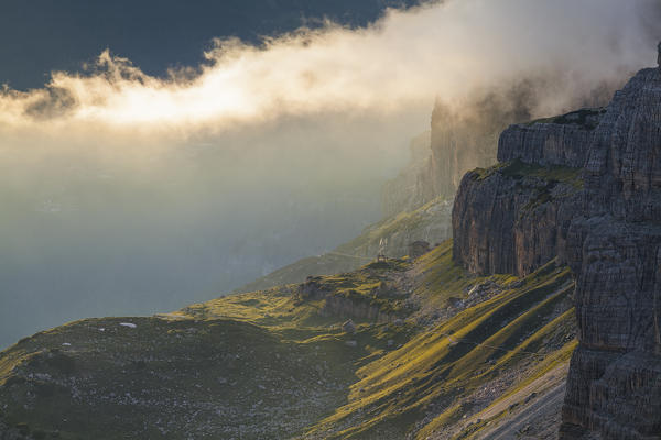 Brenta dolomites, Adamello Brenta natural park, Trento province, Trentino Alto Adige, Italy. View of Brentei refuge at sunset