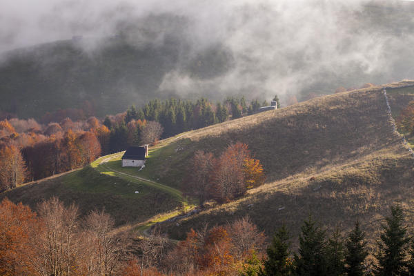 Pizzoc mountain, Veneto, Italy. A farmhouse with fog