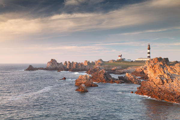 Ouessant island, Bretagne, France. The last sun rays illuminated the Creac'h lighthouse, Bretagne, France