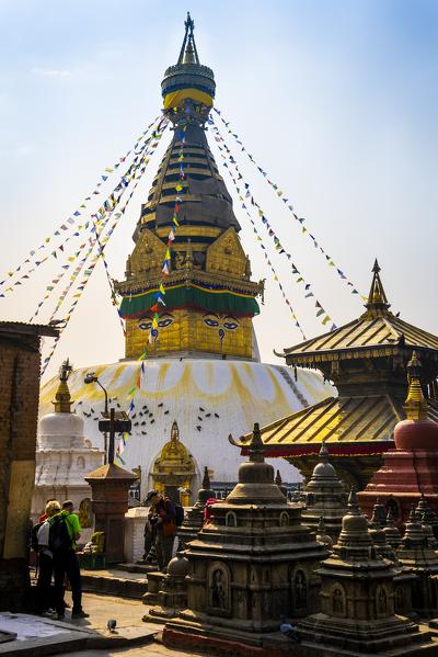 Tourists at Swayambhu Stupa also known as the Monkey Temple, Kathmandu, Nepal, Nepalese, Asia, Asian, Himalayan Country, Himalayas.
