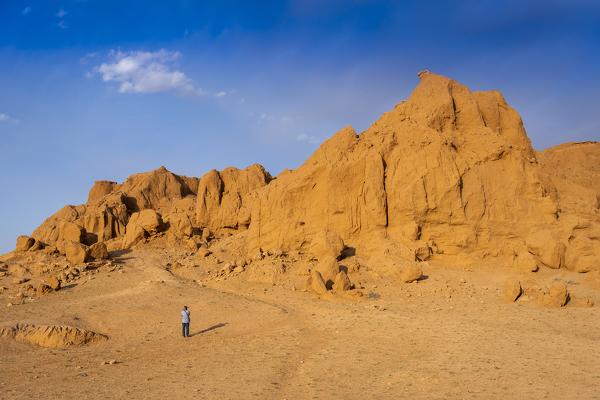 The orange rocks of Bayan Zag, commonly known as the Flaming Cliffs in the Gobi desert, Mongolia where important dinosaur fossils were found, Mongolia, Mongolian, Asia, Asian.