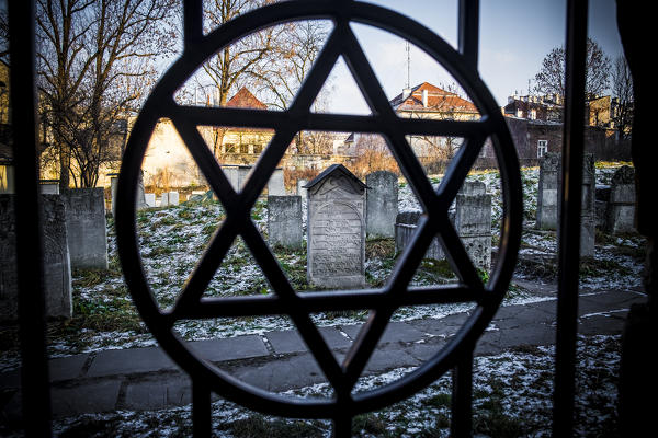 Krakow, Poland, North East Europe. Star of David symbol on the fence of the old Jewish cemetery.