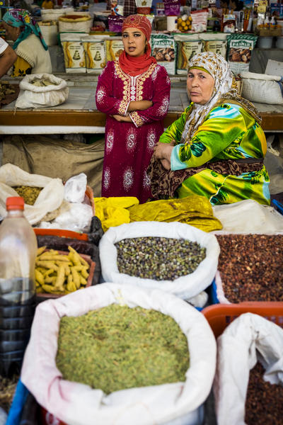 Samarkand, Uzbekistan, Central Asia. Two women in the grocery market.