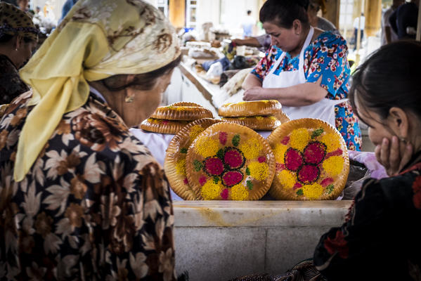 Samarkand, Uzbekistan, Central Asia. Traditional Uzbek bread in grocery market.