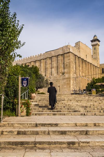 Jewish man going pray at the Tomb of the Patriarchs, Hebron, West Bank, Palestine