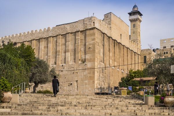 Jewish man going pray at the Tomb of the Patriarchs, Hebron, West Bank, Palestine