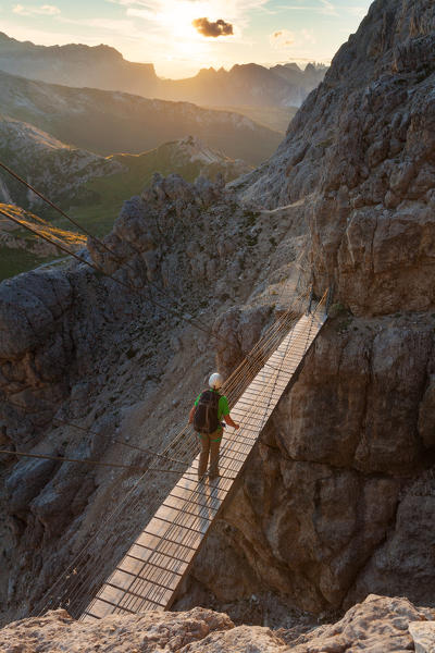 Walking the path of Kaiserjaeger you reach a secured walking section and a suspension bridge with steel cables 15 meters long (rebuilt in the same place as the original Austrian anchors which are still visible, the teeth and the supporting portions of the ropes originals). Dolomites, Lagazuoi, Italy