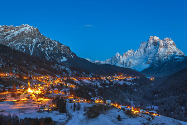 Europe, Italy, Veneto, Belluno. Dusk in the villages of Selva di Cadore, Santa Fosca and Pescul, Dolomites.