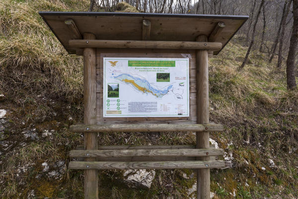 Information board at the beginning of the road closed to traffic to Case Salet, Monti del Sole, National Park of Dolomiti Bellunesi