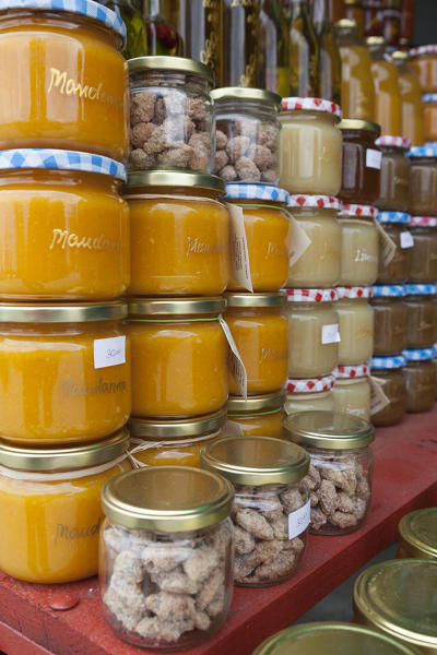 Marmalade and other local products homemade, for sale in a market along the road near komin, croatia