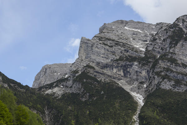 The northern side of the Piz de Mezodi', on the left side the Bus de le Neole fork. Monti del Sole, Belluno Dolomites National Park