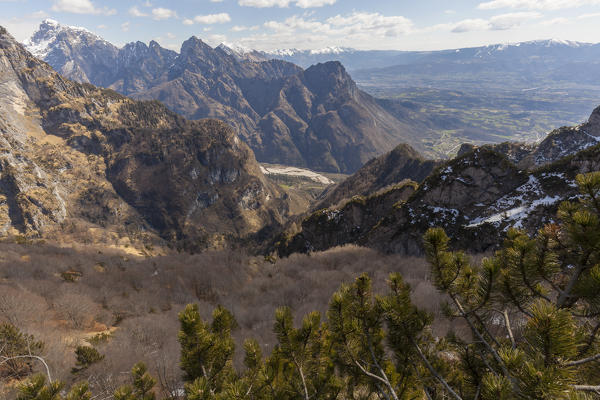 Italy, Veneto, Belluno, Dolomites. View towards val Cordevole from the final ridge of the val Salet. In the background the Valbelluna with Alpago mountains and Col Visentin.