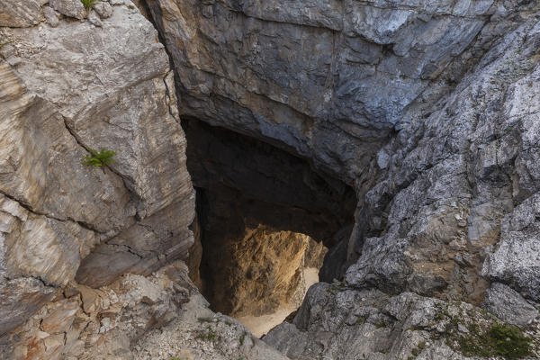 europe, North Italy, Veneto, Belluno, Monti del Sole, Dolomites. Bus de le neole (hole of the clouds)
