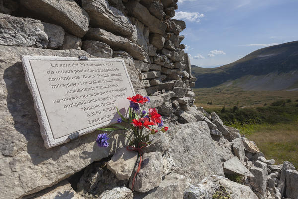 Europe, Italy, Veneto, Belluno. Military memorial stone at passo Pietena, Vette Feltrine, Belluno Dolomites National Park