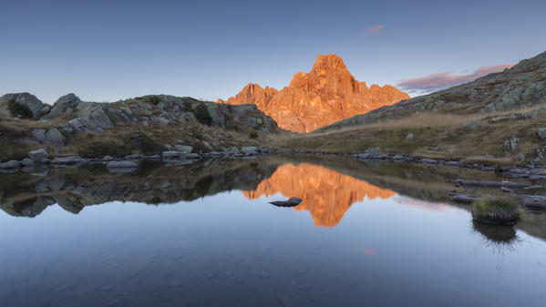 Europe, Italy, Trentino, Rolle pass. Cimon della Pala reflected in the lakes of Cavallazza at sunset, Dolomites