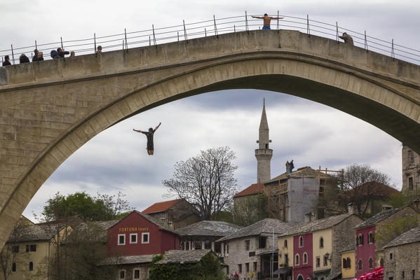 Eastern Europe, Mostar, Bosnia and Herzegovina. 
The famous jump in the Naretva river from the Stari Most (Old Bridge)