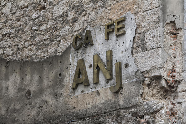 Eastern Europe, Mostar, Bosnia and Herzegovina. 
The marks of war in the Balkans on the walls of the city.