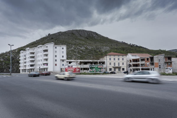 Eastern Europe, Mostar, Bosnia and Herzegovina. 
New buildings and ruins along the streets of Mostar