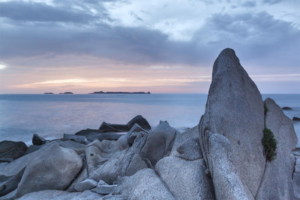 Europe, Italy, Sardinia, Cagliari. 
Sunrise on the rocks of Punta Molentis, Villasimius
