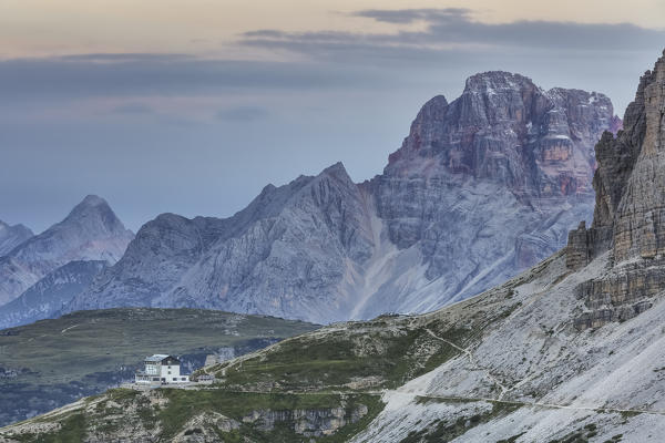 Europe, Italy, Veneto, Belluno. Auronzo hut at the foots of Tre Cime di Lavaredo, on the background Croda Rossa, Dolomites