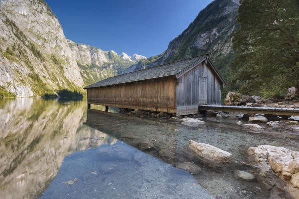 Europe, Germany, Bavaria, Berchtesgaden. Boat dock hangar on Obersee alpine lake in the Alps