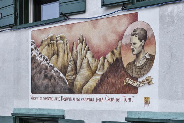 Europe, Italy, Veneto, Belluno. Painting dedicated to Ettore Castiglioni outside the refuge G. Carducci, Giralba valley, Sexten Dolomites