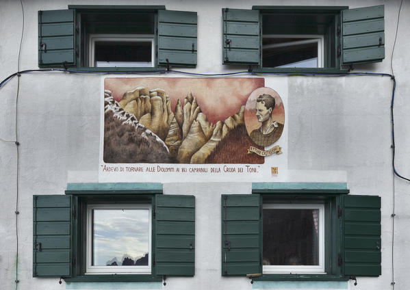 Europe, Italy, Veneto, Belluno. Painting dedicated to Ettore Castiglioni outside the refuge G. Carducci, Giralba valley, Sexten Dolomites