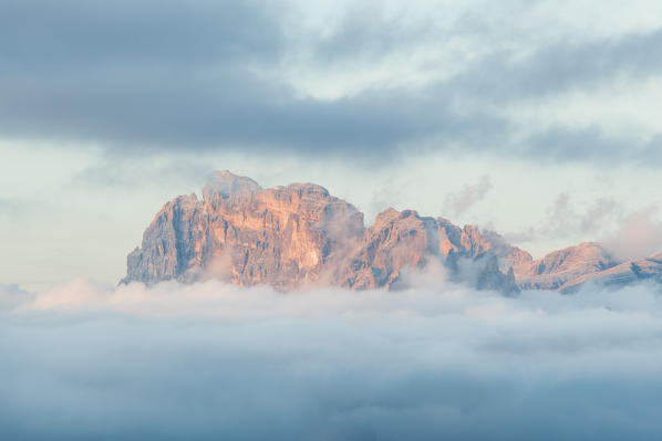 europe, Italy, Veneto, Cadore, Auronzo. Sunset towards Croda dei Toni in the clouds, sexten dolomites