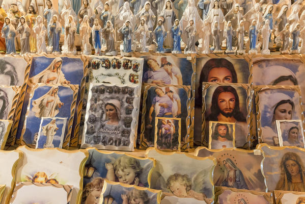 Europe, Bosnia and Erzegovina, Medjugorje. Religious images in a gift shop