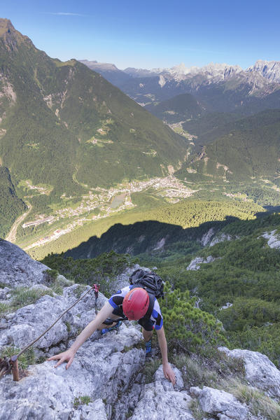 Europe, Italy, Veneto, Agordo, mountain climber on the via ferrata Fiamme Gialle at Palazza Alta of Pelsa, Civetta group, Dolomites