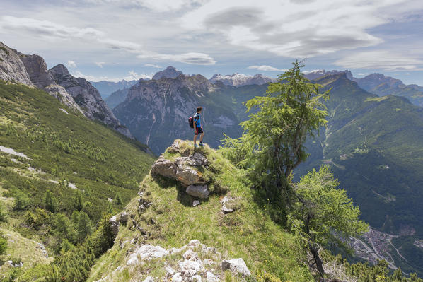 Europe, Italy, Veneto, Agordino, Dolomites, hiker on the path CAI 571 of Pelsa mount, Civetta goup