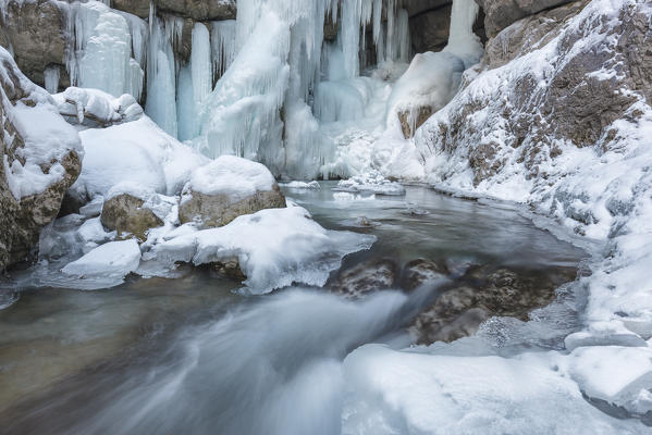 Europe, Italy, Veneto, Belluno, Sappada, Ice details in the Piave stream near the waterfall of Acqua Tona
