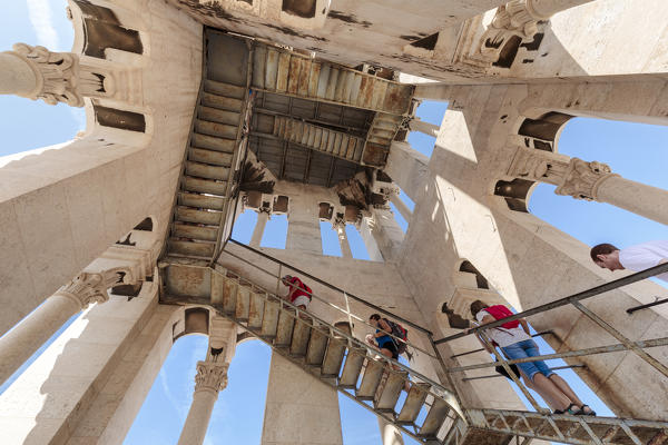 Tourists on the stairs inside the bell tower of Cathedral of Saint Domnius at the Diocletian's Palace in Split, Dalmatia, Croatia