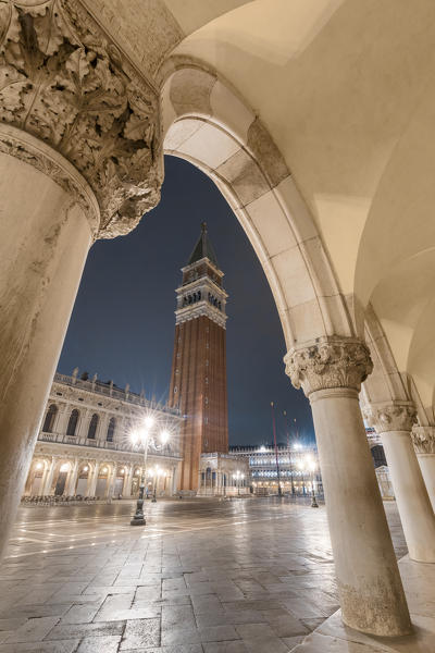 St. Mark’s bell tower seen from the colonnade of Doge’s Palace, Venice, Veneto, Italy