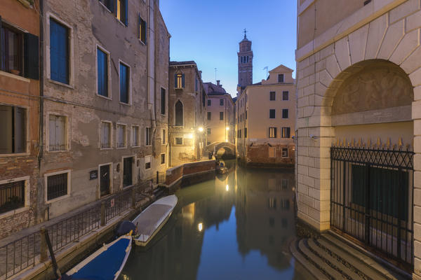 A venetian water canal at dusk, Venice, Veneto, Italy