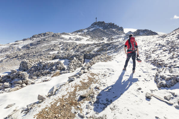 mountaineer near the peak of the mount Gr. Kinigat (Cavallino), Kartitsch, East Tyrol, Austria, Europe