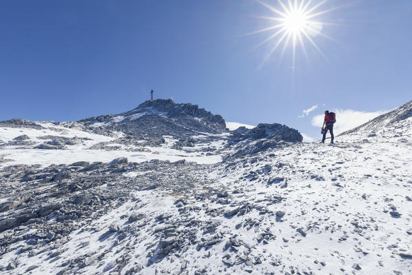 mountaineer near the peak of the mount Gr. Kinigat (Cavallino), Kartitsch, East Tyrol, Austria, Europe