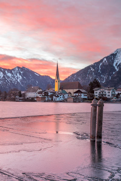 Winter sunrise in Rottach-Egern with the frozen Tegernsee Lake, District Miesbach, Upper Bavaria, Germany, Europe