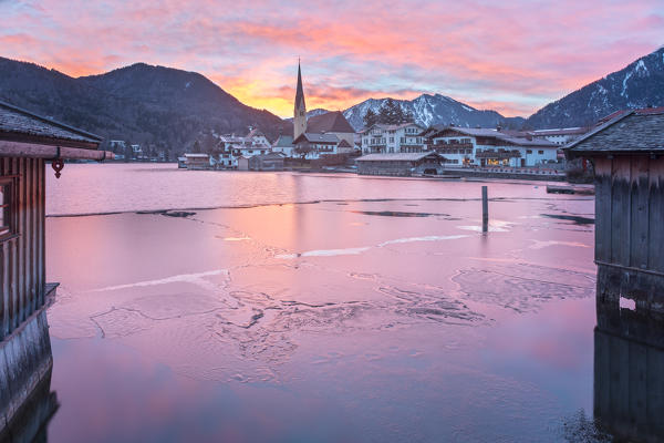 Winter sunrise in Rottach-Egern with the frozen Tegernsee Lake, District Miesbach, Upper Bavaria, Germany, Europe