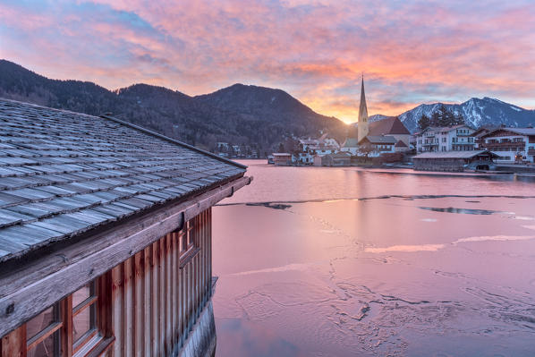 Winter sunrise in Rottach-Egern with the frozen Tegernsee Lake, District Miesbach, Upper Bavaria, Germany, Europe