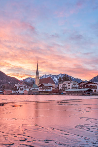 Winter sunrise in Rottach-Egern with the frozen Tegernsee Lake, District Miesbach, Upper Bavaria, Germany, Europe