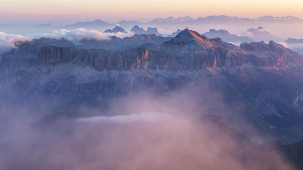 Aerial view of Sella group with the highest point of Piz Boe, as seen from Marmolada. Dolomites, Belluno, Trento, Bolzano, Italy, Europe