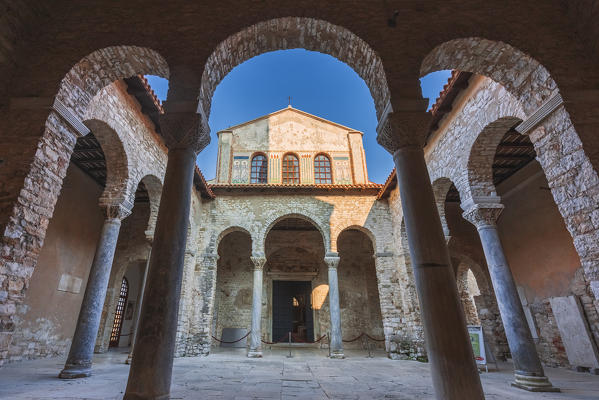 Porec - Parenzo, Euphrasian Basilica, arcades and tower view, unesco world heritage site, Istria, Adriatic coast, Croatia
