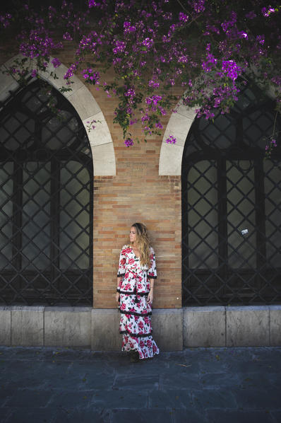 A girl in a typical spanish dress in Seville, Andalucia, Spain 