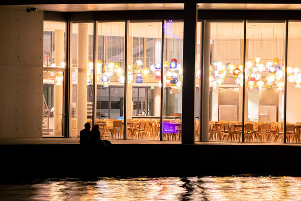 Two lovers on Sporea River in front of Paul Lobe Haus. Mitte, Berlin, Germany.