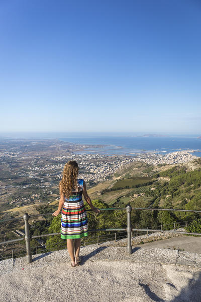 A girl walking in Erice, a small village near Trapani, Western side of Sicily, Italy