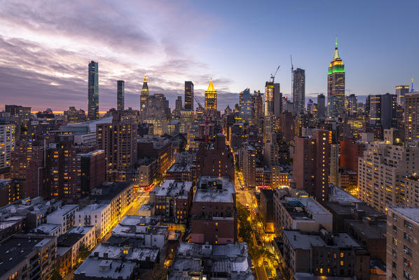 Manhattan  Skyline during sunset with Empire State Building. New York, USA.