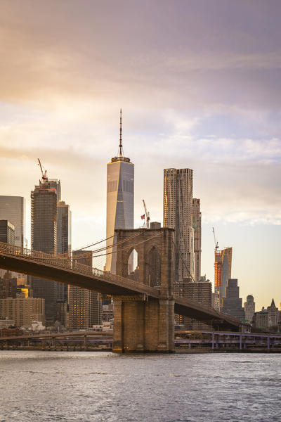 The Liberty Tower and Brooklyn Bridge from Dumbo district, in Brooklyn. Manhattan, New York City, USA