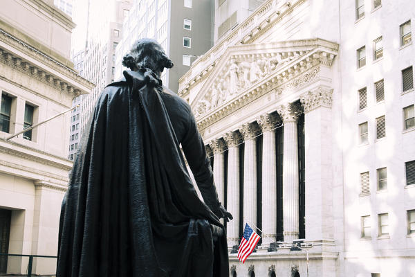 External view of Wall Street and New York Stock Exchange with George Washington statue. Manhattan, New York, USA